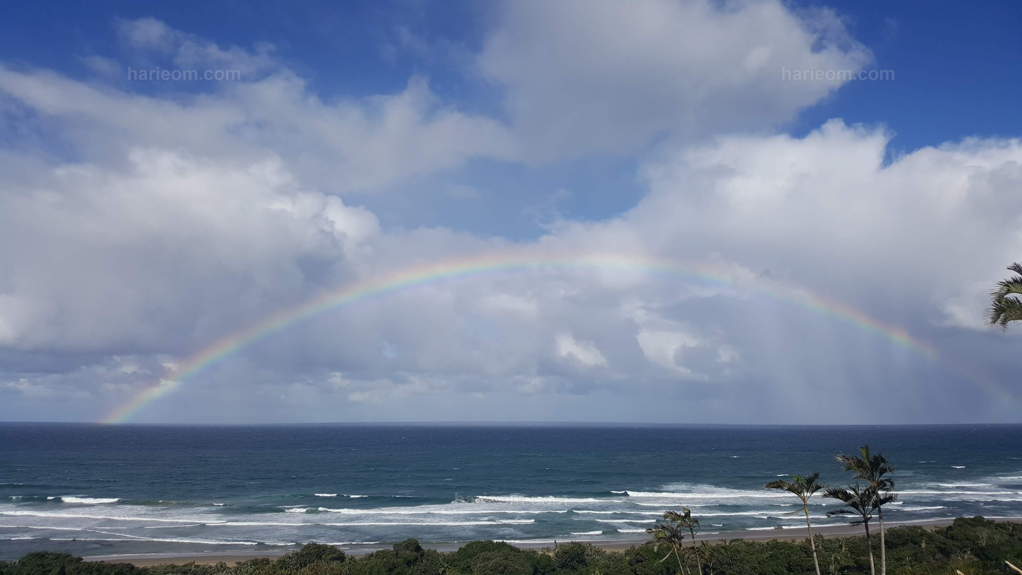 Rainbow over the ocean at Harie Om